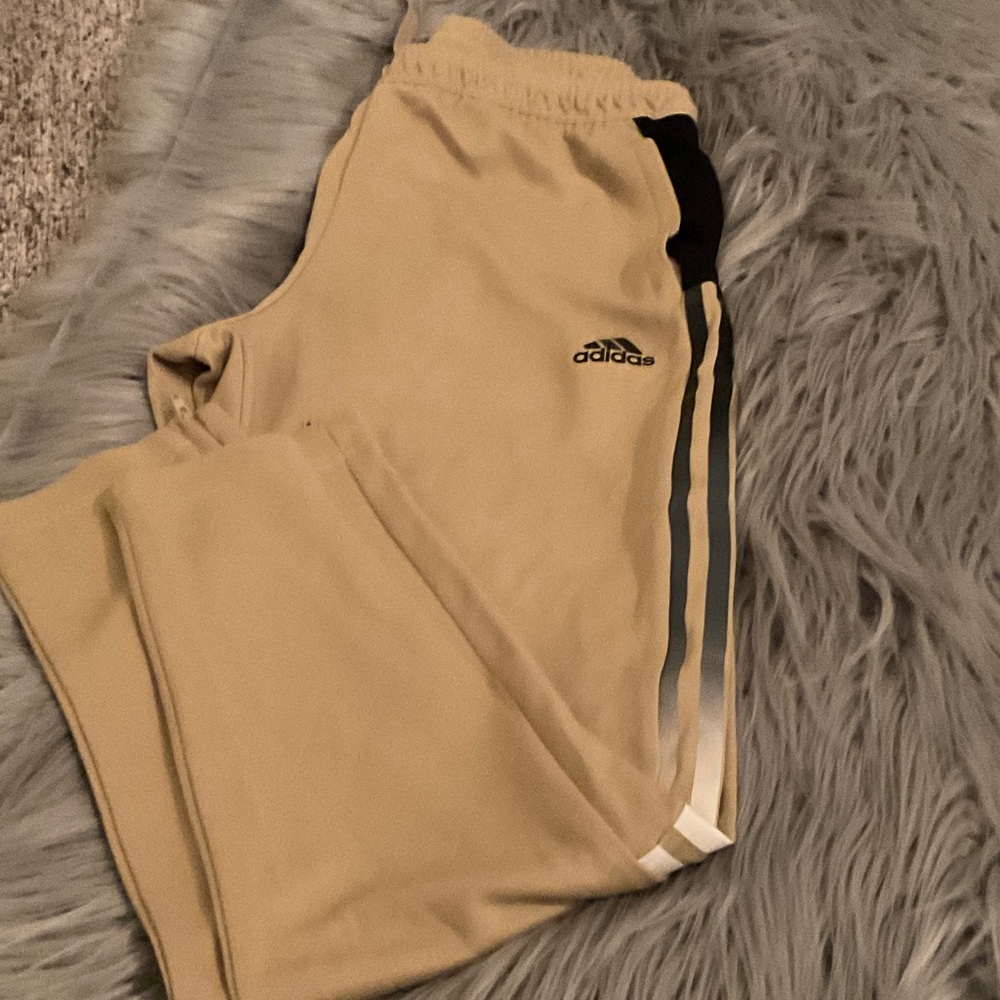 Adidas Men’s Gold Joggers with Black and White Stripes.